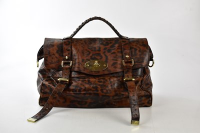 Lot 736 - MULBERRY; a black and brown leather shiny oak...