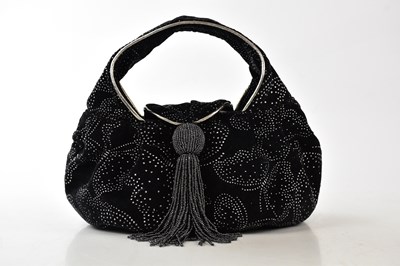 Lot 768 - LULU GUINNESS; an unused black velvet evening...