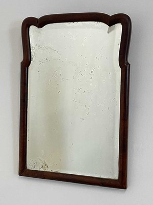 Lot 498 - An 18th century walnut wall mirror with...