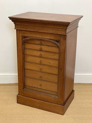 Lot 483 - An early 20th century oak collector’s chest...