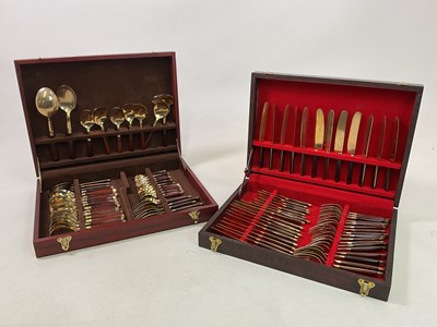 Lot 325 - Two cased canteens of bronze cutlery with...