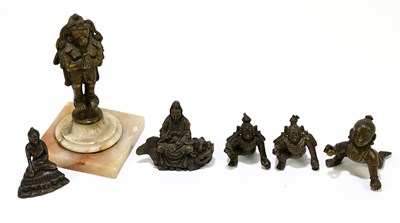 Lot 560 - A cast bronze figure of Hanuman, together with...