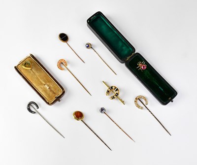 Lot 1177 - A collection of nine yellow metal and other...