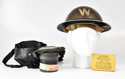 Lot 447 - An Air Raid Warden's helmet, with 'W' to the...