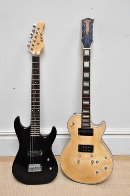 Lot 2692 - SHINE; an electric guitar, together with a Les...