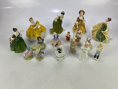 Lot 2810 - ROYAL DOULTON; a collection of figures...