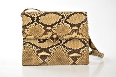 Lot 776 - A vintage python snake skin shoulder bag with...