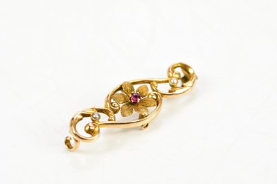 Lot 389 - A 15ct yellow gold seed pearl set floral...