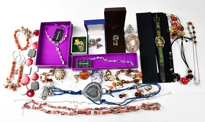 Lot 1263 - A group of costume jewellery to include amber,...