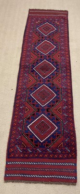 Lot 437 - A handmade wool Meshwani runner, 236 x 66cm