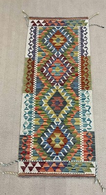 Lot 446 - A handmade wool Chobi Kilim runner, 146 x 61cm