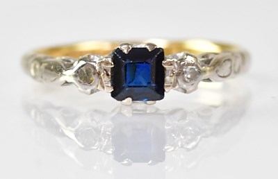 Lot 1066 - An 18ct gold diamond and sapphire set ring,...