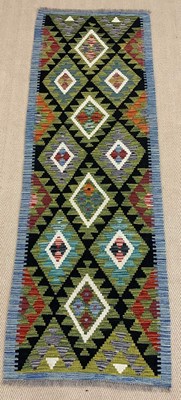 Lot 444 - A handmade Wool Maimana Kilim runner, 200 x 69cm