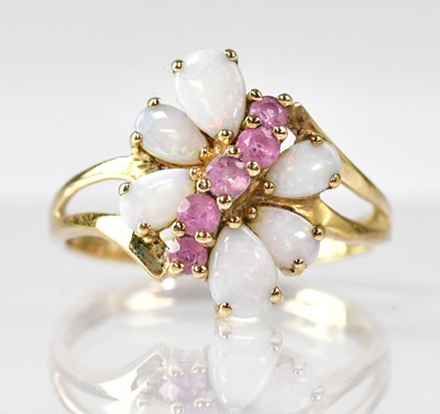 Lot 1102 - A 9ct gold amethyst and opal ring, with a...