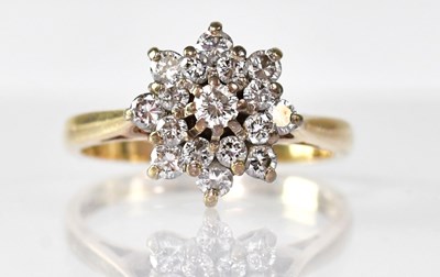 Lot 1093 - A 9ct gold small diamond cluster ring, size K,...