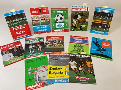 Lot 1949 - ENGLAND FOOTBALL; thirteen football programmes...