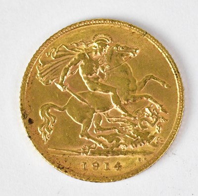 Lot 971 - A George V half sovereign 1914, George and...