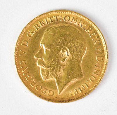 Lot 973 - A George V half sovereign 1925, George and...
