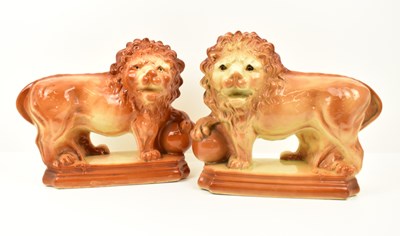 Lot 505 - A pair of Victorian pottery Medici lions, both...