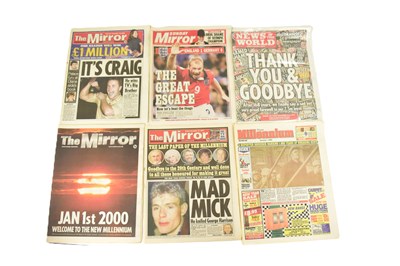 Lot 843 - A collection of six newspapers with...