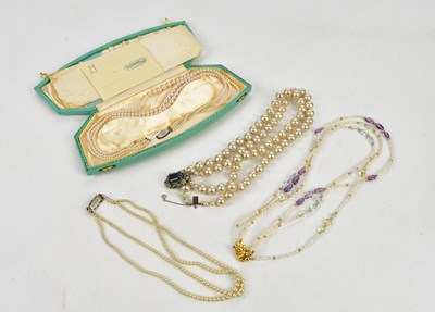 Lot 526 - Four simulated pearl necklaces.