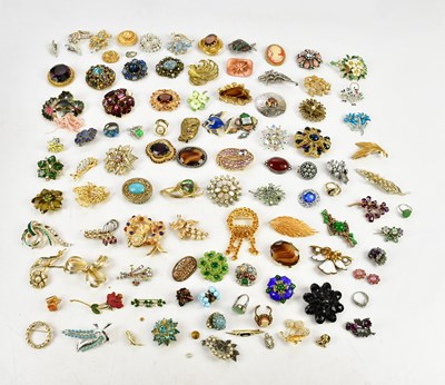 Lot 531 - An assortment of costume jewellery brooches.