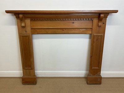 Lot 461 - A late 20th century pine fire surround with...