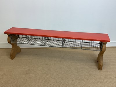 Lot 571 - An oak bench with painted top and wire rack...