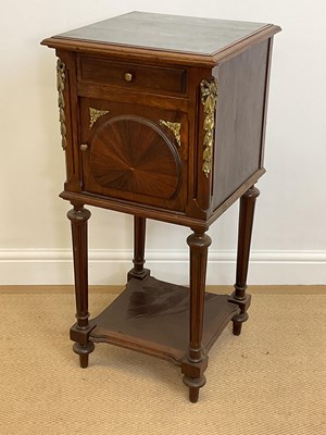 Lot 519 - A 19th century marble topped mahogany bedside...