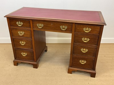 Lot 493 - A 19th century mahogany knee-hole writing desk...