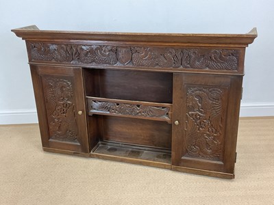 Lot 495 - A 19th century carved oak wall cabinet, with...