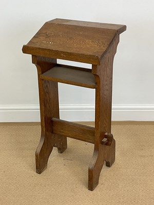 Lot 570 - An oak prayer desk prie dieu with single shelf...