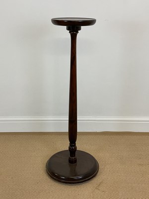 Lot 563 - A 20th century stained beech torchere on a...