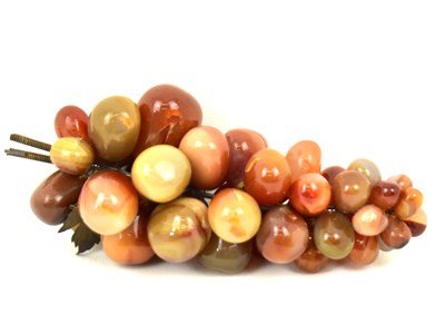Lot 562 - A large polished agate sculpture of a bunch of...