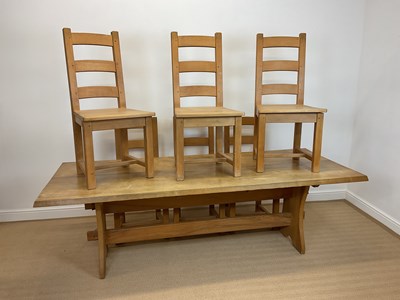 Lot 488 - A contemporary light oak table with six dining...