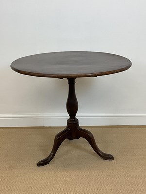 Lot 553 - A 19th century mahogany circular tilt-top...