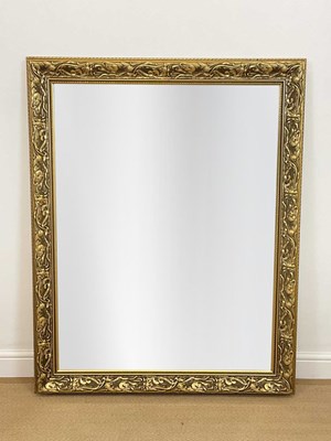 Lot 513 - A contemporary decorative gilt framed mirror,...