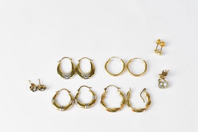 Lot 1231 - Seven pairs of 9ct gold earrings, to include...