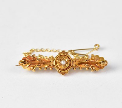 Lot 1168 - A Victorian 15ct bar brooch, with star set...