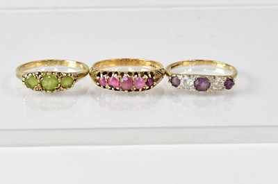 Lot 1125 - Three 9ct gold gem set dress rings, comprising...