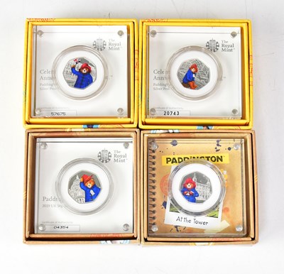 Lot 1017 - THE ROYAL MINT; four Paddington Bear fifty...