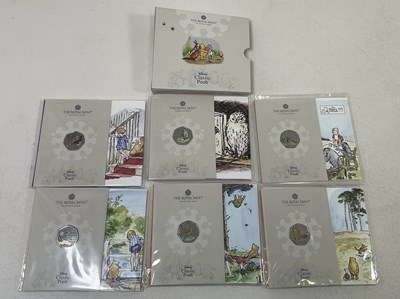 Lot 398 - ROYAL MINT; six Winnie the Pooh uncirculated...