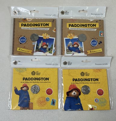 Lot 403 - ROYAL MINT; four Paddington uncirculated 50p...