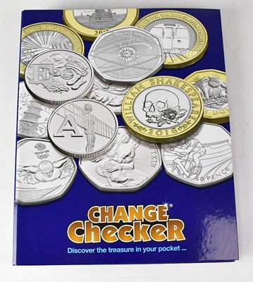 Lot 990 - CHANGE CHECKER; an album of fifty-four carded...