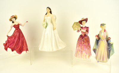 Lot 473 - ROYAL DOULTON; three porcelain figurines...
