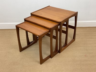 Lot 514 - G PLAN; a nest of three Quadrille teak tables,...