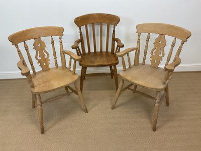 Lot 574 - Three contemporary beech farmhouse fiddle back...
