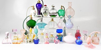 Lot 615 - A collection of perfume bottles and atomisers,...