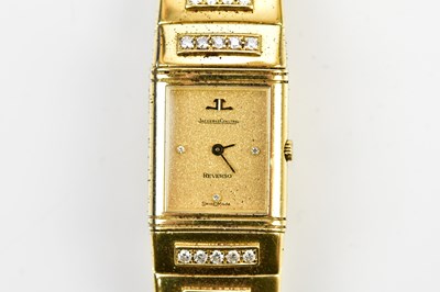 Lot 541 - JAEGER-LECOULTRE; a lady's 18ct gold Reverso...
