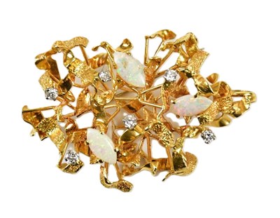 Lot 345 - An 18ct gold contemporary brooch with three...